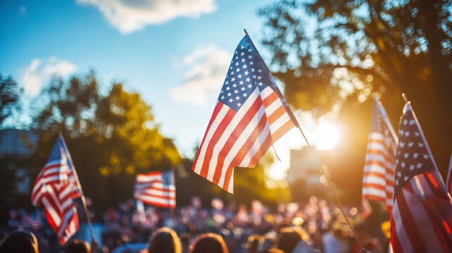 political rally in america where people are holding several flags