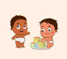 Two baby boys playing with blocks and waving 