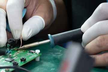 Close up scene the soldering operation by skill operator.