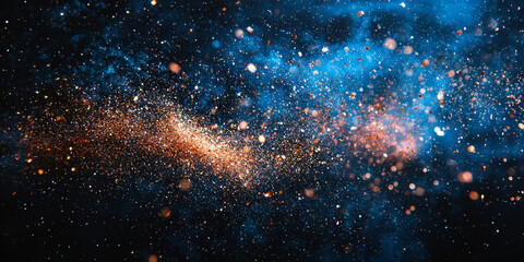 Obraz premium A mesmerizing abstract design featuring shimmering gold and blue particles on a black background.