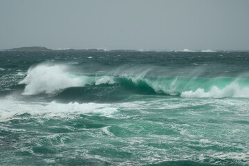 Naklejka premium The huge splashing wave of a stormy sea. Lewis and Harris, Outer Hebrides, Scotland