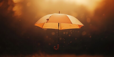 A Single Umbrella Suspended in Golden Sunset Mist