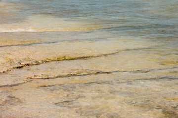 The shallow waters of Lake Michigan cover the 