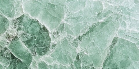 Realistic mint green stone texture featuring subtle cracks and imperfections on a natural surface