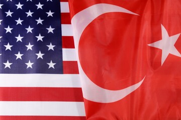 Flags of the United States and Turkey waving side by side