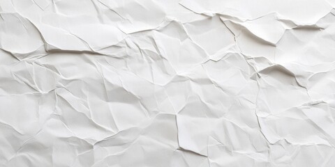 Obraz premium The close-up of white paper showcases a textured surface that is slightly crumpled and rough