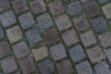 Stone texture. Square tiles in brown and gray shades in even layers at an angle © Kai Beercrafter