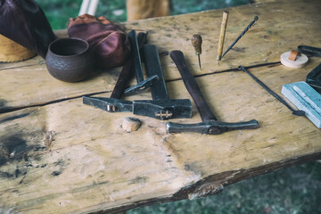 tanner's hand tool set, hammer and awl traditional tool