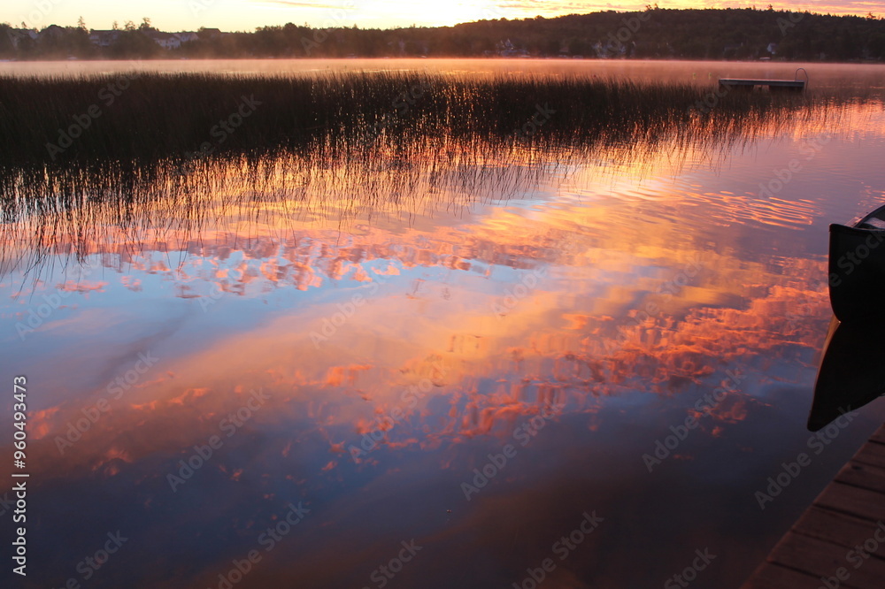 Wall mural sunrise reflection on the lake