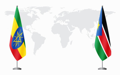 Ethiopia and South Sudan flags for official meeting against background of world map.