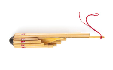 Thai circular panpipe is a traditional music instrument on a white background