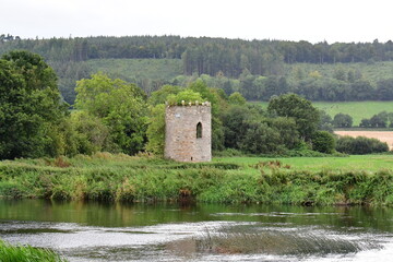 Fototapeta premium Watching tower on the bank of River Suir near the town of Carrick-on-Suir, Ireland