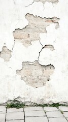 Obraz premium A textured wall with peeling paint and exposed brick, showcasing patterns of decay and urban aesthetic.