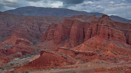 Northern Kyrgyzstan. Picturesque winding trails of the Kok Moinok canyons with red-brown rock along the Chu River.
