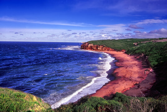 Waves wash ashore at Bells Beach along the Great Ocean Road in Victoria Australia
