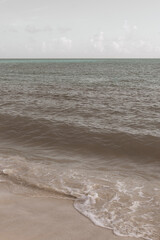 Tropical Caribbean beach clear water waves Playa del Carmen Mexico.