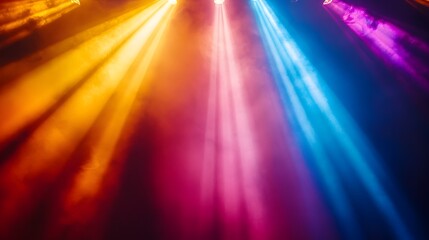 Dazzling light rays fanning out from a central source showcasing a stunning rainbow of colors in a dramatic concert setting