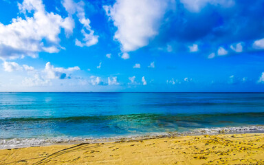 Tropical Caribbean beach people swim fun Playa del Carmen Mexico.
