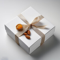 a box of nuts with a ribbon tied around the top