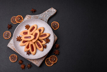 Delicious sweet crispy cookies with jam filling in the center
