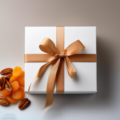 a box of nuts with a ribbon tied around the top