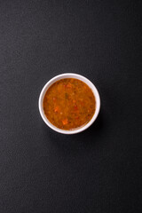 Delicious hot tomato soup with vegetables, vegan, vegetarian food