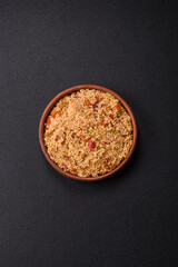 Delicious hot boiled wheat porridge couscous with vegetables