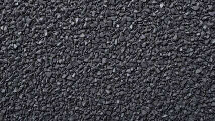Fototapeta premium black pebbles with texture as background.