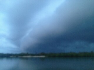Intense Thunderstorm over Florida Waters with Dark Storm Clouds