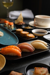 Sushi on Black Stone Table