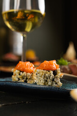 Sushi on Black Stone Table