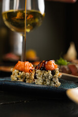 Sushi on Black Stone Table