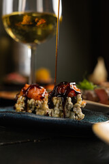 Sushi on Black Stone Table