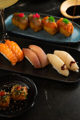 Sushi on Black Stone Table