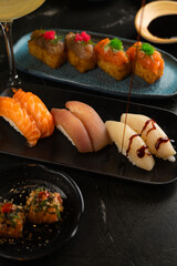 Sushi on Black Stone Table