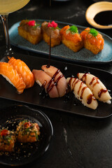 Sushi on Black Stone Table