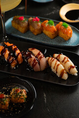 Sushi on Black Stone Table