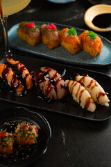 Sushi on Black Stone Table