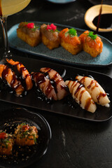 Sushi on Black Stone Table