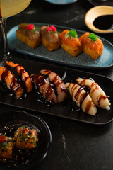 Sushi on Black Stone Table