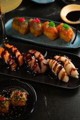 Sushi on Black Stone Table
