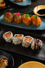 Sushi on Black Stone Table