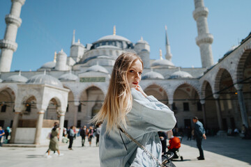 Girl in the Blue Mosque in Istanbul, Turkey. High quality photo