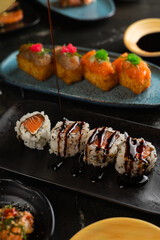 Sushi on Black Stone Table