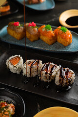 Sushi on Black Stone Table