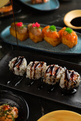 Sushi on Black Stone Table