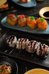 Sushi on Black Stone Table