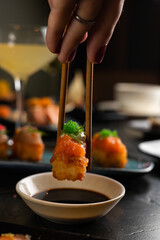 Sushi on Black Stone Table