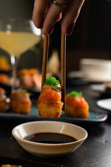 Sushi on Black Stone Table