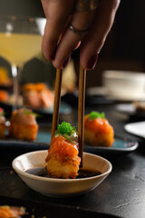 Sushi on Black Stone Table